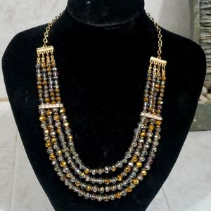 Nice green and gold tones beads with rhinestones comes with earrings